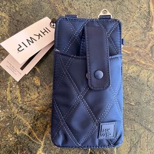 The travel Ring-Ring cellphone crossbody bag with RFID wallet